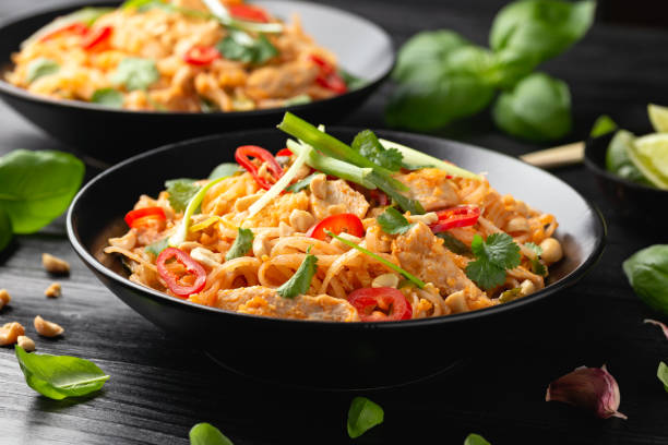 A colorful shrimp stir-fry bowl with vegetables and brown rice