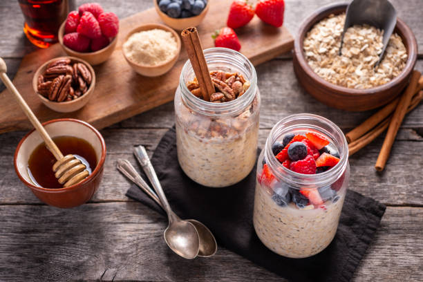 Breakfast jars  with oats, fruits, and nuts for quick energy