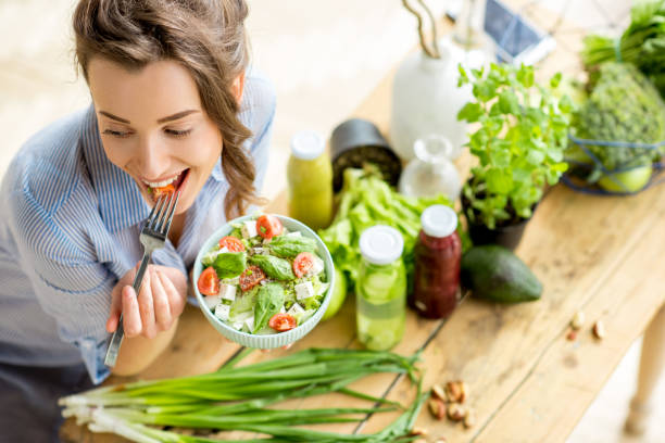 Happy person enjoying a vegan meal plan for healthy living